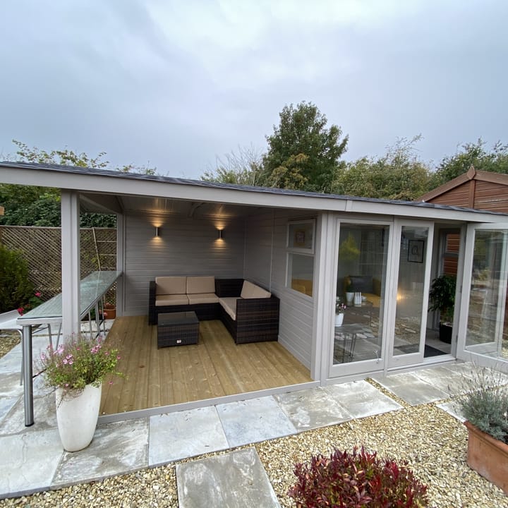10ft x 10ft Studio Pavilion painted in optional "Fleet Grey' colour. This 10 x 10 Studio has had an 8ft wide open area extension and a bar and roof extension added to it, making the overall width of this building 18ft x 10ft. 