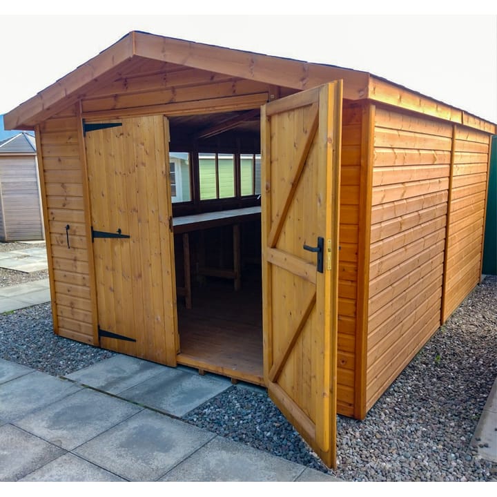 This 10ft x 14ft Heavy Duty Apex is constructed in heavy duty redwood cladding. A roof overhang and opening windows(s) are standard features. Ironmongery is available in a choice of chrome or as pictured here black. Optional felt tiles, double doors and a workbench have all been added.