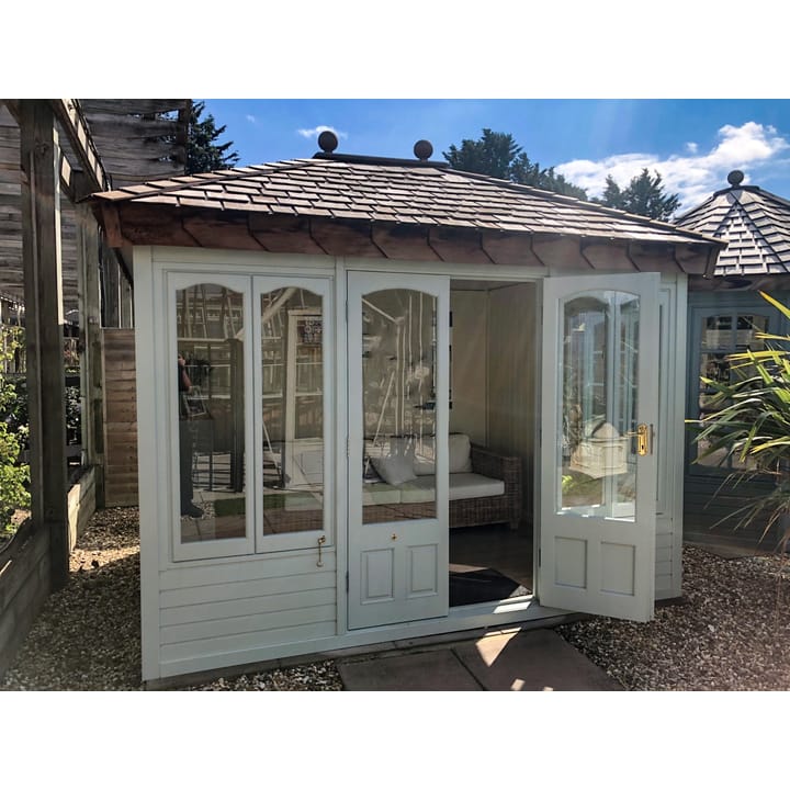 This 10ft x 8ft Malvern Ashton summerhouse is painted in Olive Grey colour. The building has also had laminate flooring added.