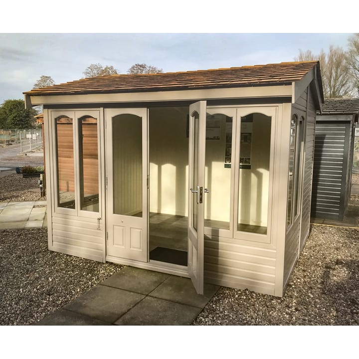This 10ft x 8ft Malvern Astwood painted in Dove Grey colour option has a very contemporary feel about it. However, the Shingle roof and arched windows, still maintain the 'cottage' elements.

Optional laminate flooring has also been added to this Astwood.
