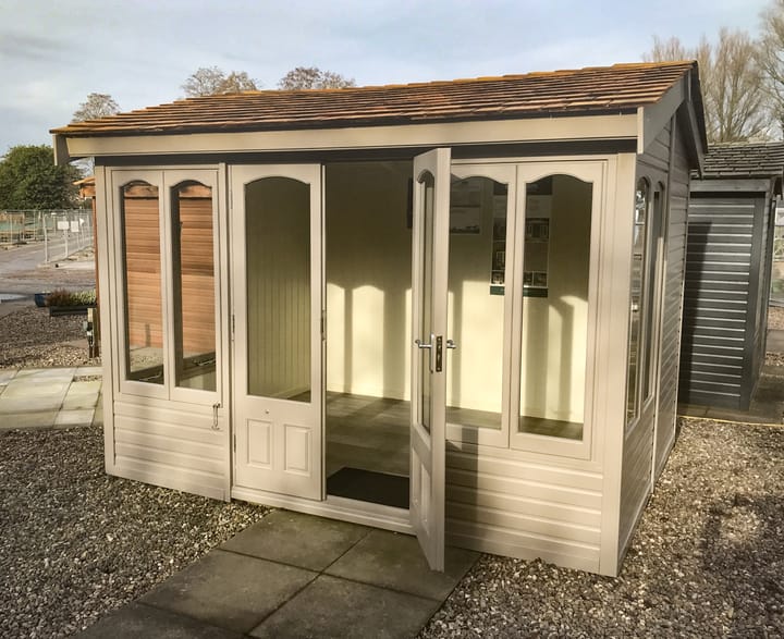 This 10ft x 8ft Malvern Astwood painted in Dove Grey colour option has a very contemporary feel about it. However, the Shingle roof and arched windows, still maintain the 'cottage' elements.

Optional laminate flooring has also been added to this Astwood.