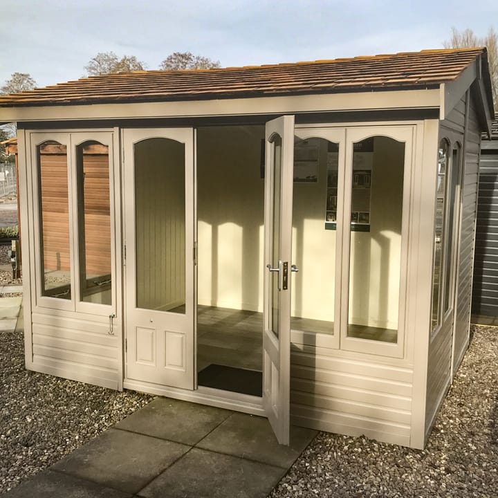 This 10ft x 8ft Malvern Astwood painted in Dove Grey colour option has a very contemporary feel about it. However, the Shingle roof and arched windows, still maintain the 'cottage' elements.

Optional laminate flooring has also been added to this Astwood.