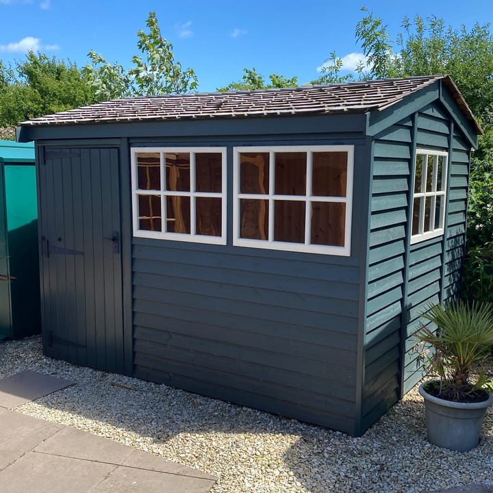 This 10ft x 8ft Heavy Duty Pavilion Apex is constructed in Heavy Duty Barnstyle cladding. A choice of door & window furniture is available in either chrome, or as pictured here black.

There are a number of optional upgrades pictured including; 'Green Black' painted finish, cedar shingle roof and Georgian windows upgrade.