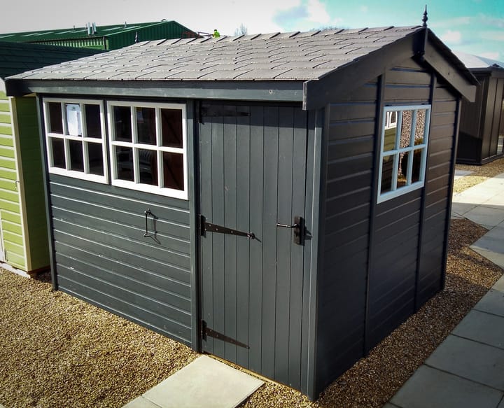 This 10ft x 8ft Heavy Duty Pavilion Apex is constructed in Heavy Duty Redwood cladding. A choice of door & window furniture is available in either chrome, or as pictured here black.

There are a number of optional upgrades pictured including; 'Squid Ink' painted finish, slate effect shingle roof and Georgian windows upgrade.