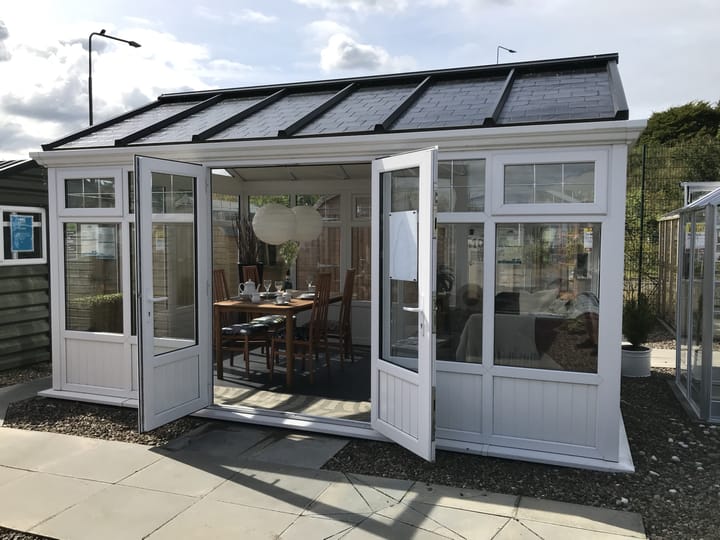 The Wiltshire Plus includes a polycarbonate roof as standard, you can choose to upgrade this to an optional deluxe glass roof or, as pictured here a tile effect roof.