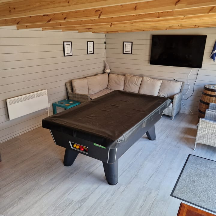 The uses of a Lillevilla Log Cabin are plentifold. Here this customer has used their 6m x 3m cabin as a games room and bar.