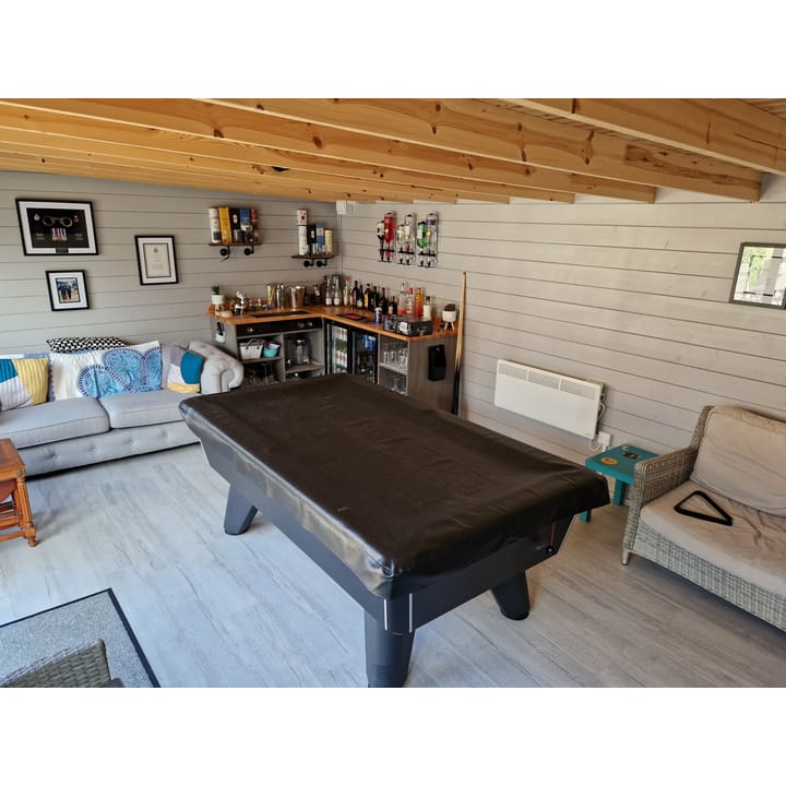 The uses of a Lillevilla Log Cabin are plentifold. Here this customer has used their 6m x 3m cabin as a games room and bar.