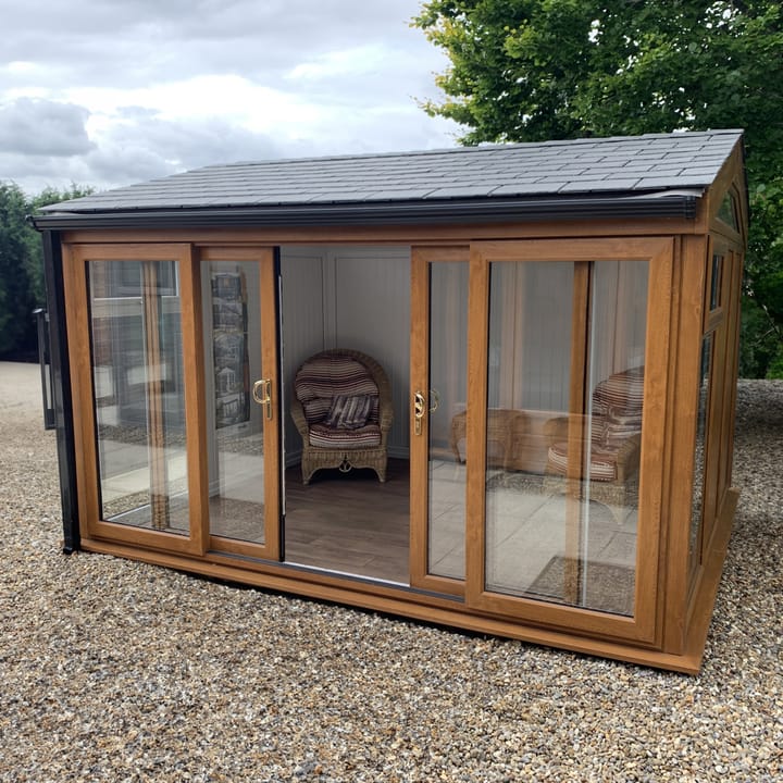 Nordic Greenwich Pavilion 3.6m x 3m in Golden Oak.

If you want uninterrupted views of your garden, then the Greenwich Pavilion may well be the ideal garden room for you. The fully glazed front of the building allows plenty of natural light without obscuring the view.