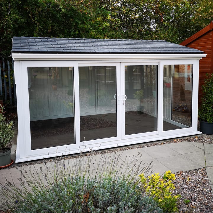 Nordic Greenwich Pavilion Ultimate Package 4.2m x 3m in White.

If you want uninterrupted views of your garden, then the Greenwich Pavilion may well be the ideal garden room for you. The fully glazed front of the building allows plenty of natural light without obscuring the view.