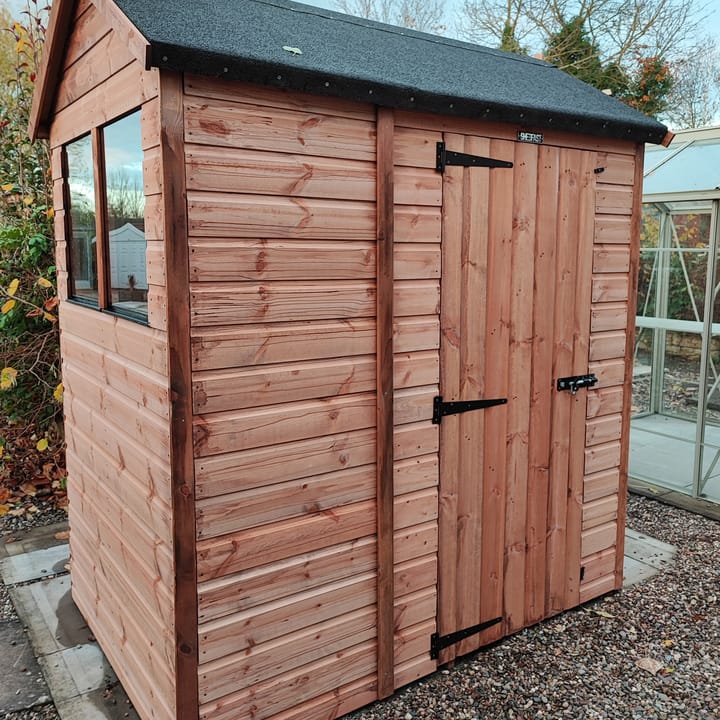The Shedfast Apex shed is available in a range of sizes to suit all. 
Pictured here is the 4ft x 6ft model. The interchangeable windows and doors mean they can be positioned in any combination to suit your needs. The door is positioned on the side of this shed, but can easily be fitted in the gable end.

Black roofing felt is supplied as standard and the double pane windows are toughened safety glass with a pvc bottom cill.