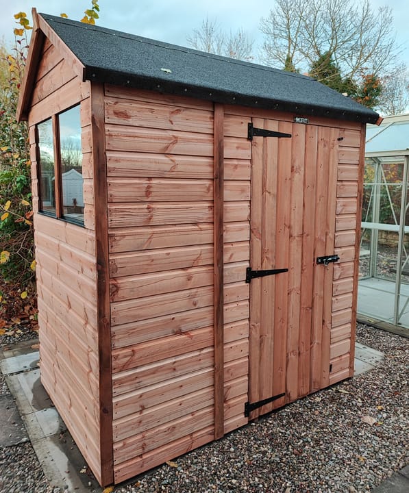 The Shedfast Apex shed is available in a range of sizes to suit all. 
Pictured here is the 4ft x 8ft model. The interchangeable windows and doors mean they can be positioned in any combination to suit your needs. The door is positioned on the side of this shed, but can easily be fitted in the gable end.

Black roofing felt is supplied as standard and the double pane windows are toughened safety glass with a pvc bottom cill.