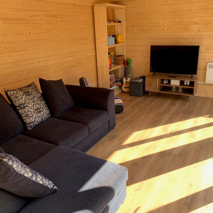 The uses of a Lillevilla Log Cabin are plentifold. Here this customer has used their 5.2m x 2.5m cabin as an additional lounge space.