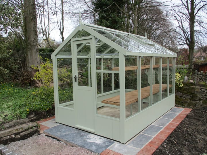This 6ft x 10ft Swallow Kingfisher greenhouse has the optional 'Vert De Terre' painted finish. Optional high level shelving has been added to this greenhouse.