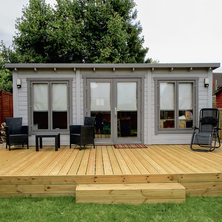 The Lillevilla Pent Log Cabin is a stylish and practical addition to any outdoor space, with its sturdy 44mm thick pine log construction and energy-efficient double glazing. Measuring 6m by 4m, this cabin is perfectly sized for a variety of uses, from a home office to a cozy retreat. It's topped with a durable EPDM roof, ensuring it stands strong against the elements while providing a modern silhouette against any garden backdrop.