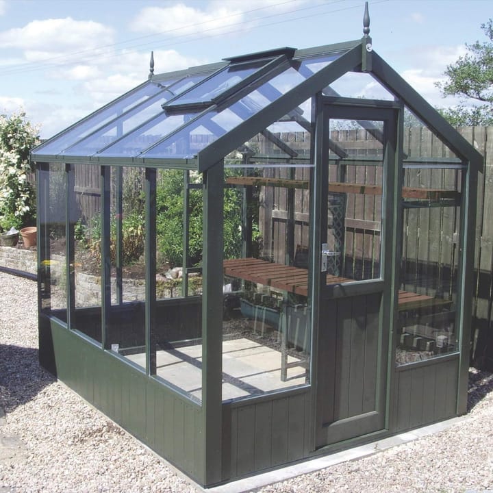 This 6ft x 8ft Swallow Kingfisher greenhouse has the optional 'Olive Green' painted finish. Optional high level shelving has been added to this greenhouse.