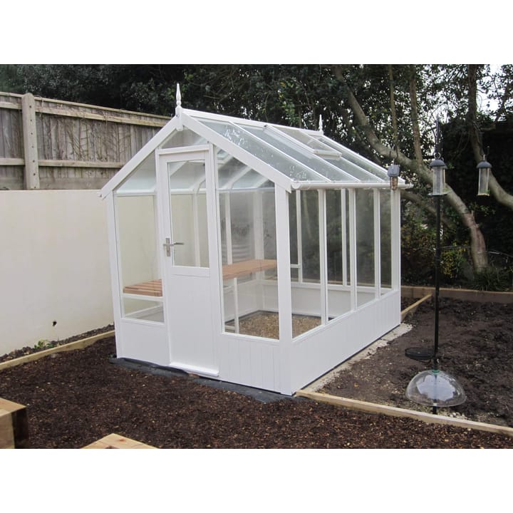 This 6ft x 8ft Swallow Kingfisher greenhouse has the optional 'Lily White' painted finish. Optional high level shelving and guttering have been added to this greenhouse.