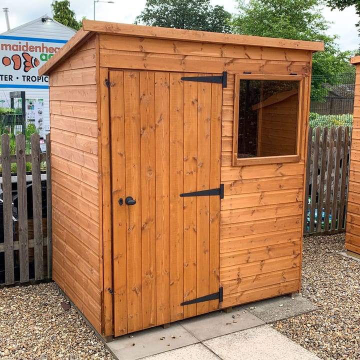 6ft x 4ft Bewdley Pent in Redwood on display at our Norwich branch. The door has been positioned on the front to the left of the window. Note the opening window, a standard feature on all Bewdley sheds.