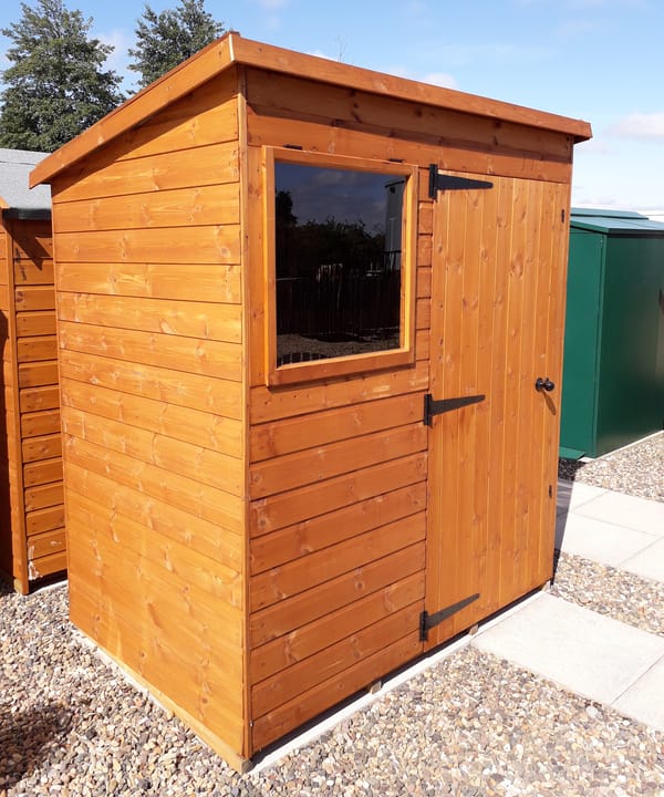 6ft x 4ft Bewdley Pent in Redwood on display at our Ponteland branch. The door has been positioned on the front to the right of the window. Note the opening window, a standard feature on all Bewdley sheds.