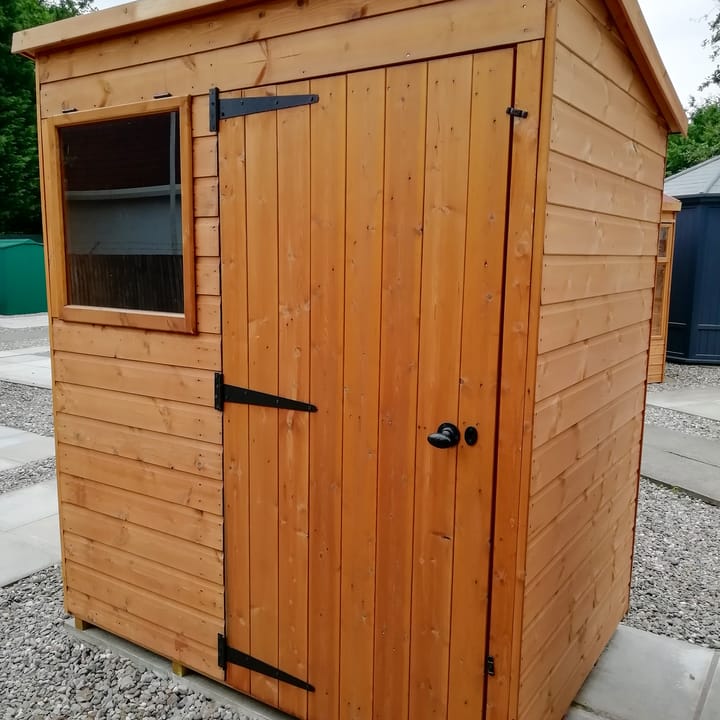 6ft x 4ft Bewdley Pent in Redwood on display at our Solihull branch. The door has been positioned on the front to the right of the window. Note the opening window, a standard feature on all Bewdley sheds.