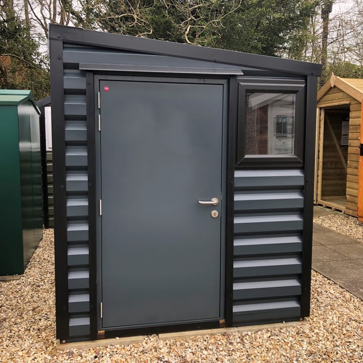This Lifelong Pent is 6ft wide x 7ft deep and is finished in Anthracite colour. This building has upgraded the standard white upvc window to the optional black upvc window and the door has been upgraded to the insulated 3-point locking door.