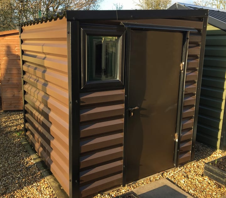 This Lifelong Pent is 6ft wide x 7ft deep and is finished in Vandyke Brown colour. The door can be positioned on either the left or the right and can be hinged on either side. This building has upgraded the standard white upvc window to the optional black upvc window.