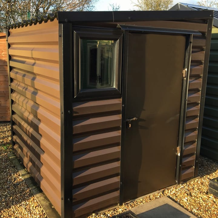 This Lifelong Pent is 6ft wide x 7ft deep and is finished in Vandyke Brown colour. The door can be positioned on either the left or the right and can be hinged on either side. This building has upgraded the standard white upvc window to the optional black upvc window.