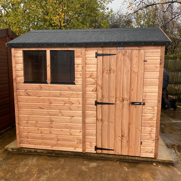 The Shedfast Apex shed is available in a range of sizes to suit all. 
Pictured here is the 6ft x 8ft model. The interchangeable windows and doors mean they can be positioned in any combination to suit your needs. The door is positioned in the side of this shed, but can easily be fitted to the gable end.

Black roofing felt is supplied as standard and the double pane windows are toughened safety glass with a pvc bottom cill.The Shedfast Apex shed is available in a range of sizes to suit all. 
Pictured here is the 6ft x 8ft model. The interchangeable windows and doors mean they can be positioned in any combination to suit your needs. The door is positioned in the side of this shed, but can easily be fitted to the gable end.

Black roofing felt is supplied as standard and the double pane windows are toughened safety glass with a pvc bottom cill.