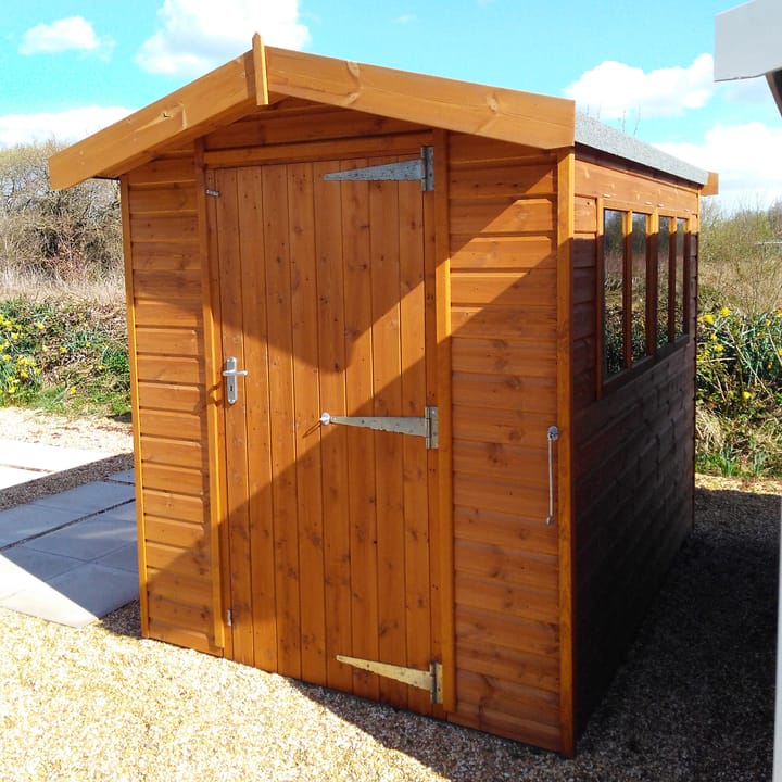 This 6ft x 8ft Heavy Duty Apex is constructed in heavy duty redwood cladding. A roof overhang and opening windows(s) are standard features. Ironmongery is available in a choice of black or as pictured here chrome.