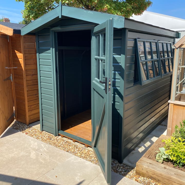 This 6ft x 8ft Heavy Duty Apex is constructed in Heavy Duty Redwood one of four timber options available with the Heavy Duty range, the other options being Heavy Duty Pressure Treated Redwood, Cedar and Heavy Duty Barnstyle cladding.
This Shed has had an optional painted finish in Green Black, as well as optional Georgian windows, Georgian window in the door, felt tiled roof, shelving and a workbench.
Optional installation available.