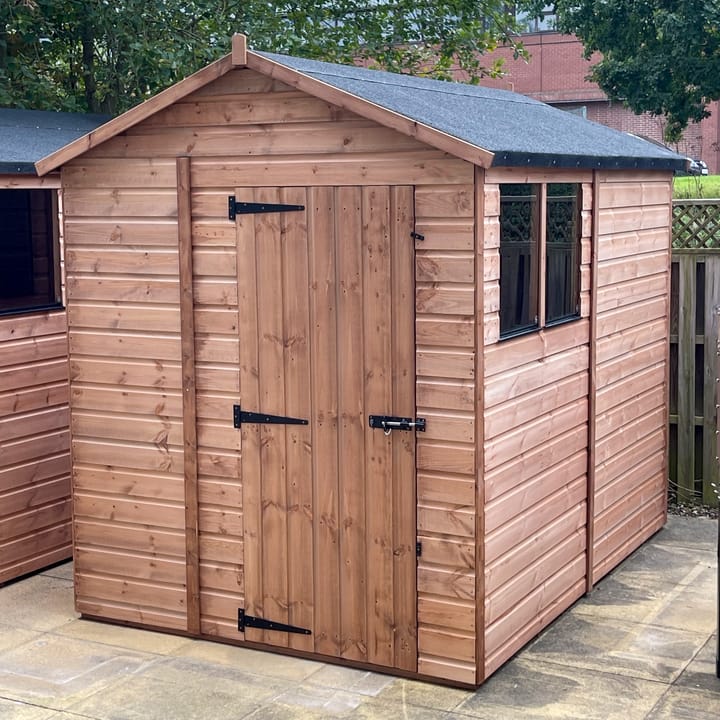 The Shedfast Apex shed is available in a range of sizes to suit all. 
Pictured here is the 6ft x 8ft model. The interchangeable windows and doors mean they can be positioned in any combination to suit your needs. The door is positioned in the gable end of this shed, but can easily be fitted on the side.

Black roofing felt is supplied as standard and the double pane windows are toughened safety glass with a pvc bottom cill.