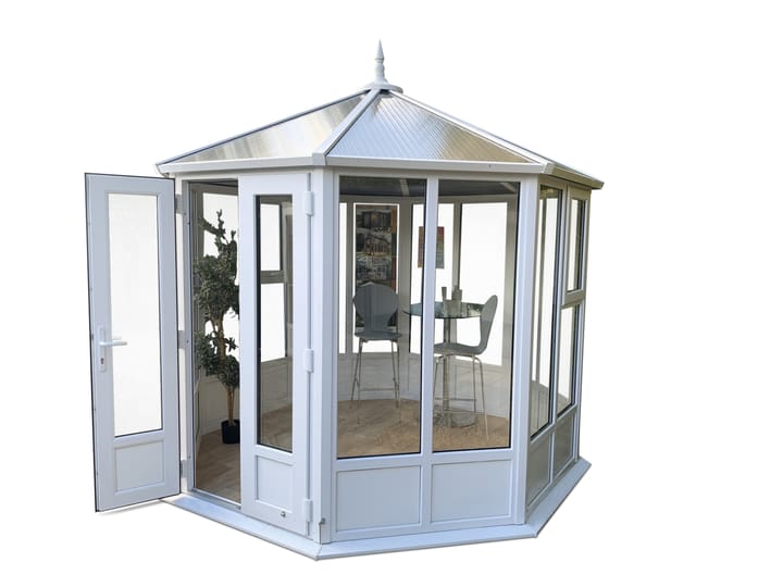 This 8ft 8in x 8ft 8in Sylt Pavilion is finished in white PVCu as standard. Optional extras in the building as shown include; a roof finial and vinyl flooring.