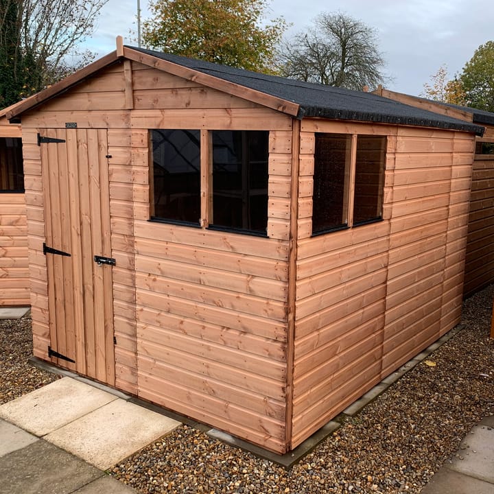 The Shedfast Apex shed is available in a range of sizes to suit all. 
Pictured here is the 8ft x 10ft model. The interchangeable windows and doors mean they can be positioned in any combination to suit your needs. The door is positioned in the gable end of this shed, but can easily be fitted to the side.

Black roofing felt is supplied as standard and the double pane windows are toughened safety glass with a pvc bottom cill.