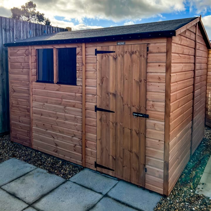 The Shedfast Apex shed is available in a range of sizes to suit all. 
Pictured here is the 8ft x 10ft model. The interchangeable windows and doors mean they can be positioned in any combination to suit your needs. The door is positioned in the side of this shed, but can easily be fitted to the gable end.

Black roofing felt is supplied as standard and the double pane windows are toughened safety glass with a pvc bottom cill.