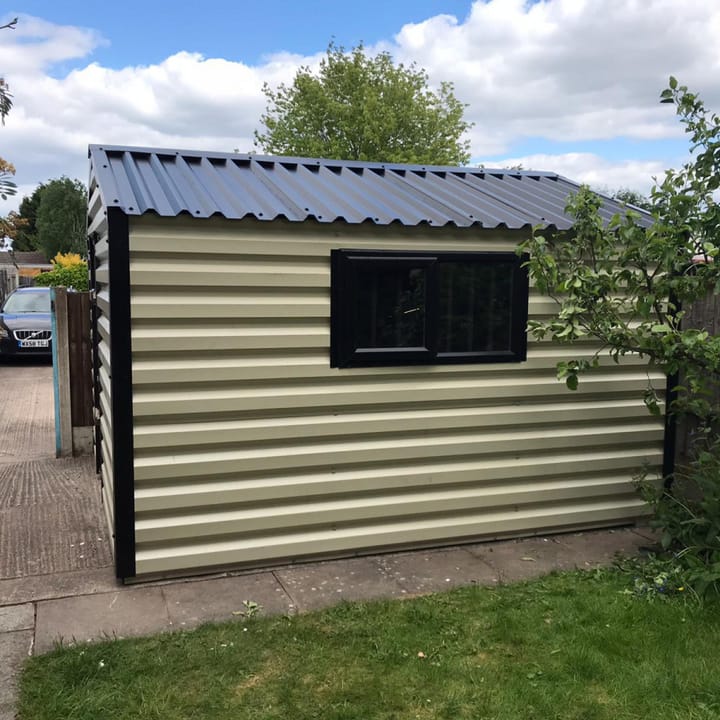 An 8ft wide x 10ft long Lifelong Apex in Goosewing Grey. This building has upgraded the window from white to black upvc and moved the window from the front of the shed to the side.
