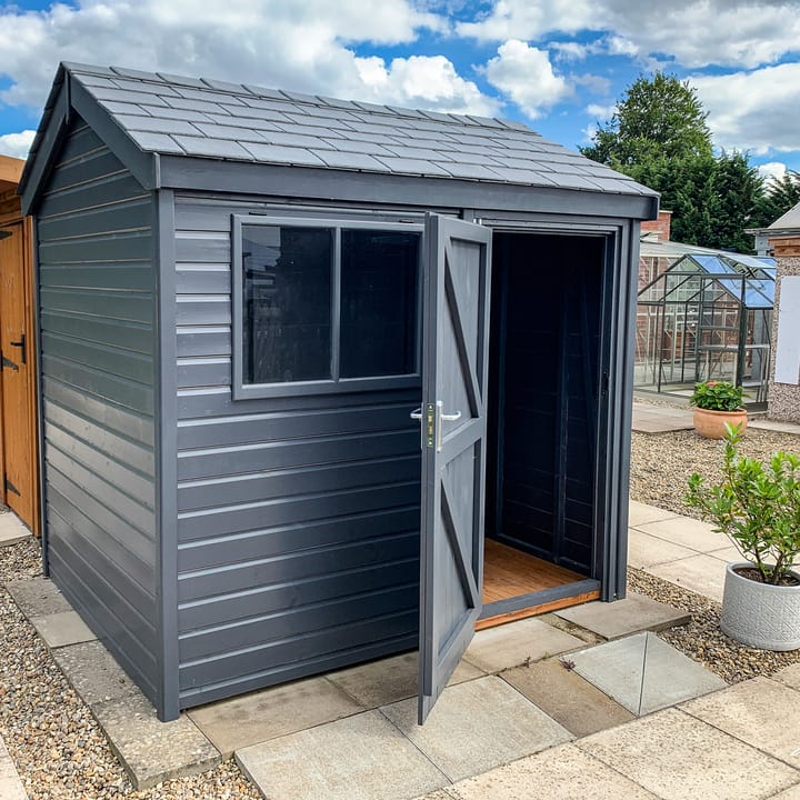 This 8ft x 6ft Heavy Duty Pavilion Apex is constructed in Heavy Duty Redwood cladding. A choice of door & window furniture is available in either black, or as pictured here chrome.

There are a number of optional upgrades pictured including; 'Graphite Grey' painted finish and a slate effect roof.
