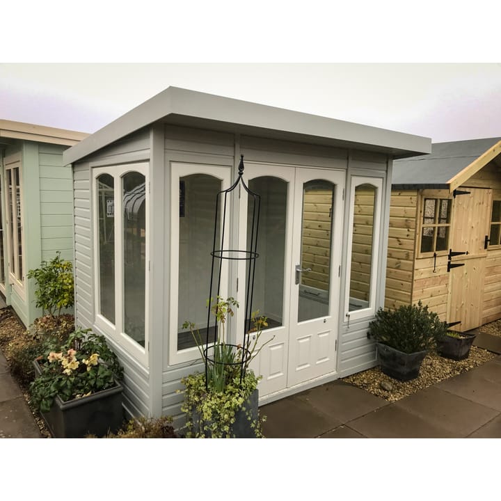 This 8ft x 6ft Malvern Stretton painted in Dove Grey colour option has a very contemporary feel about it. However, the arched windows and 'two-tone' painted finish, still maintain the 'cottage' elements.

Optional laminate flooring has also been added to this Stretton.