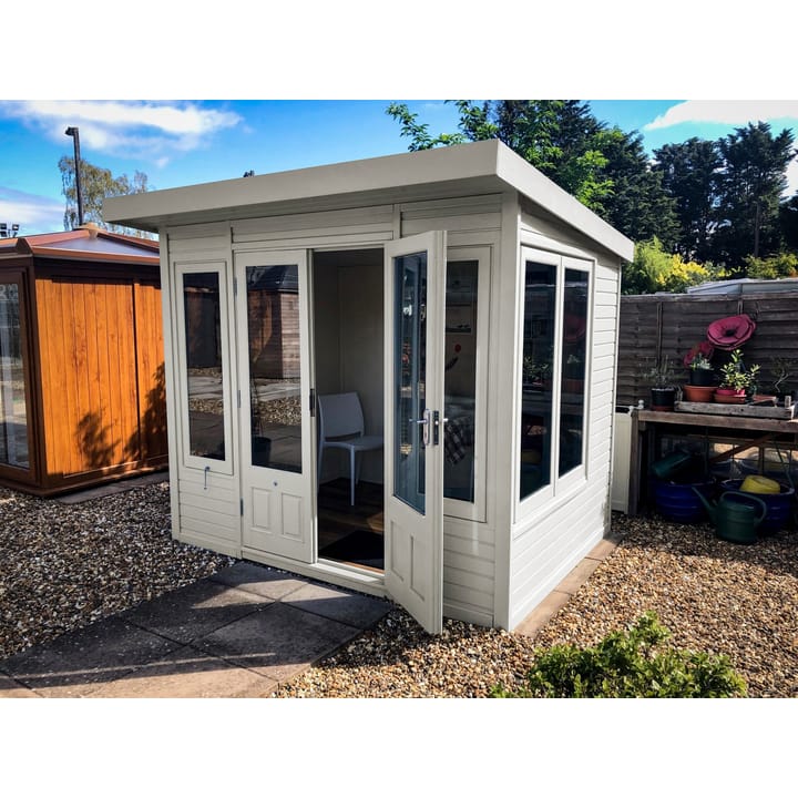 This 8ft x 6ft Malvern Stretton summerhouse is painted in optional Vintage White colour finish. Optional laminate flooring, painted mdf lining and insulation has also been added. Square top windows have been chosen, as has the optional tinted glass upgrade.