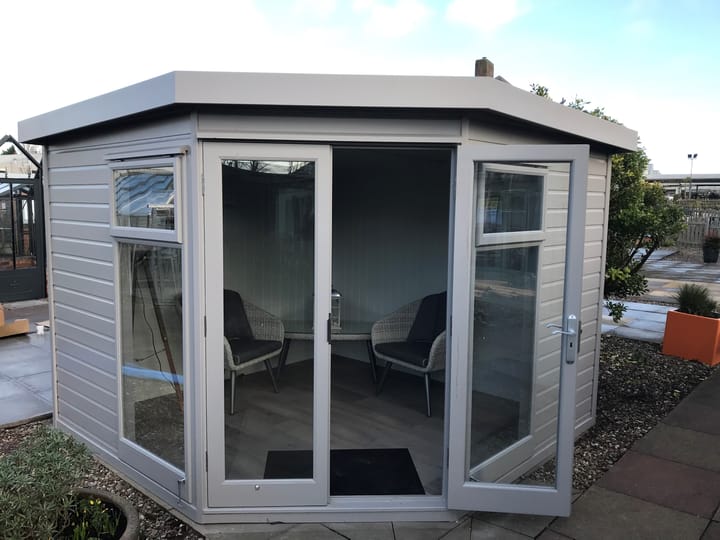 This 9ft x 9ft Studio Pent has been constructed in Redwood cladding, and painted in 'Fleet Grey' optional painted finish. Painted MDF lining and insulation and a laminate floor are other optional extras that have been added.