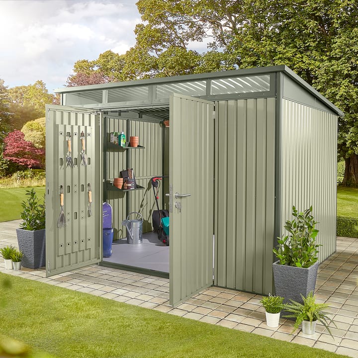 10 x 8 HEX Hixon shed in Sage Green. The Hixon features double opening doors to the front. The doors include an integrated organisation panel, ideal for hanging garden tools. Transom windows run the width of the building above the doors, allowing light through. The Hixon is also available in Anthracite.