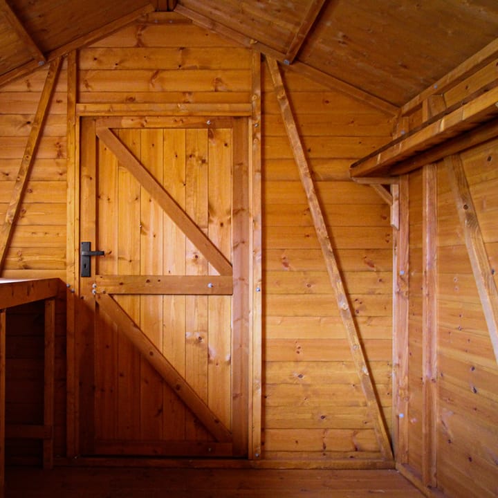 This interior view illustrates the diagonal bracing in the gable end section and side panel - Without these the front of the building would go out of square and the doors wouldn't open properly. A simple precaution you would think but one which isn't featured on many competitors' buildings.