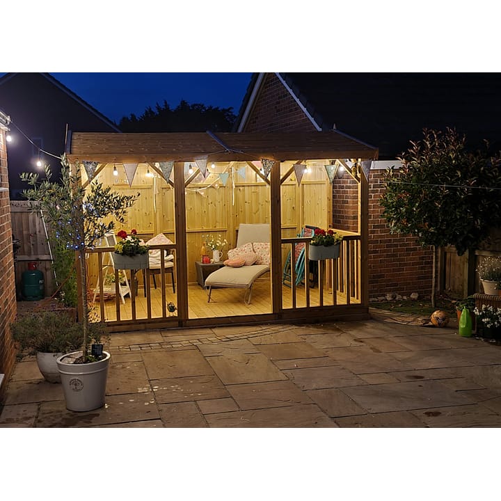 With a little lighting and decoration, the Hanbury Apex is the ideal summerhouse to entertain guests on warm summer evenings.