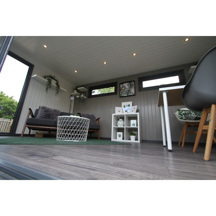 This interior view of a Hanley Plus garden room, illustrates how the styling and colour scheme can be used to great effect. The mdf lining on the back wall has been painted in a shade of grey and creates a focal point of this building.