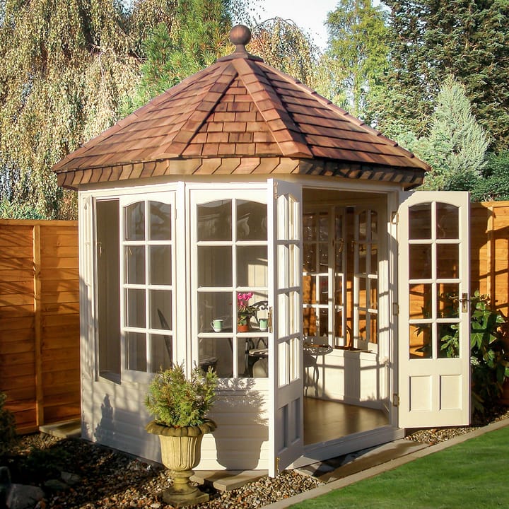 This 7ft 7in x 7ft 7in Malvern Hopton summerhouse has the optional painted finish applied in Vintage White. Also featured is the optional Georgian window upgrade, cedar shingle roof, painted mdf lining & insulation, brass upgrade and laminate floor.