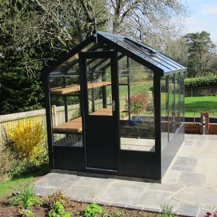 This 6ft x 8ft Swallow Kingfisher greenhouse has the optional 'Anthracite' painted finish. Optional high level shelving has been added to this greenhouse.