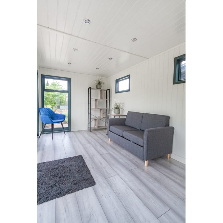 You can choose to line your garden room with either tongue and groove pine boards, or as pictured here - painted mdf lining. Both lining options include ufoil thermal insulation, for all year-round warmth. The optional laminate floor adds a nice finishing touch this garden room.
