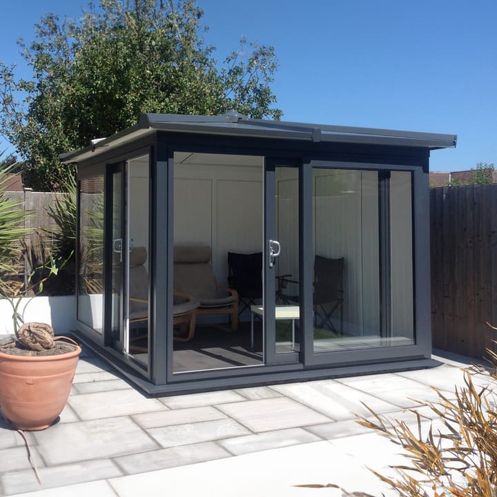 This Nordic Madison Corner Hipped is the 2.7m x 2.7m model in optional Grey finish. Other optional upgrades for this building as shown are the tile effect roof and vinyl flooring.