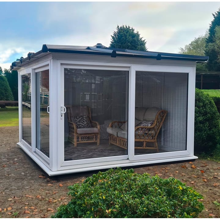This Nordic Madison Corner Hipped is the 3.3m x 3.3m model in optional White finish. Other optional upgrades for this building as shown are the tile effect roof and vinyl flooring.