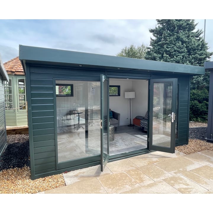 This Studio Flat measures 14ft wide x 10ft deep. Optional Green Black painted finish, painted mdf lining and insulation and laminate flooring are also on display.
