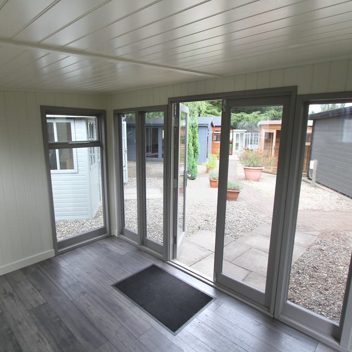 You can choose to line your Studio Pent garden room with either tongue and groove pine boards, or as pictured here on this Studio Pavilion - painted mdf lining. Both lining options include ufoil thermal insulation, for all year-round warmth. The optional laminate floor adds a nice finishing touch this garden room.