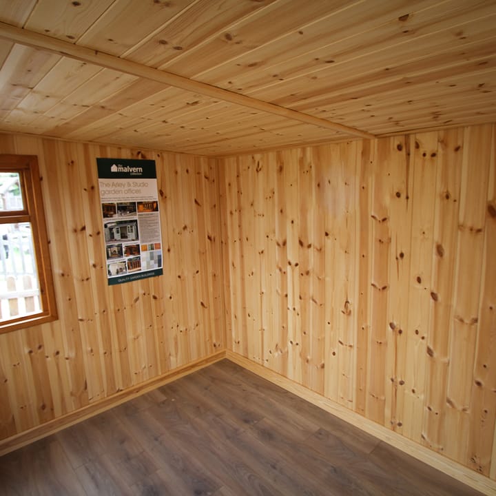 This picture illustrates the optional tongue and groove pine lining. It is carefully fitted to provide a pleasant working environment. As the walls and roof are insulated with thermal ufoil insulation when the building is lined, your garden room will be more than suitable for all year-round use.